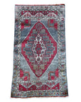 Semi-Antique wool hand knotted rug with red and grey coloring.